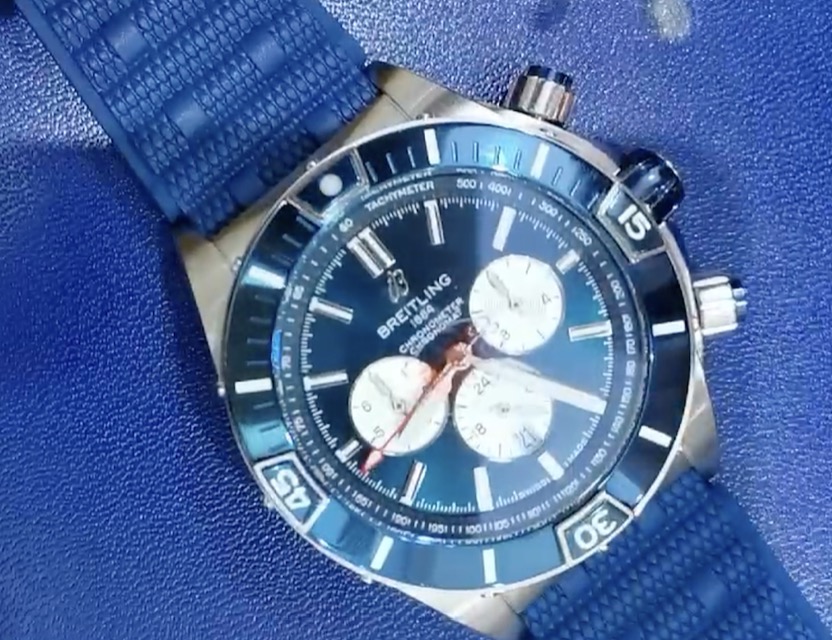 335usd for Breitling watch with extra 3 steel straps